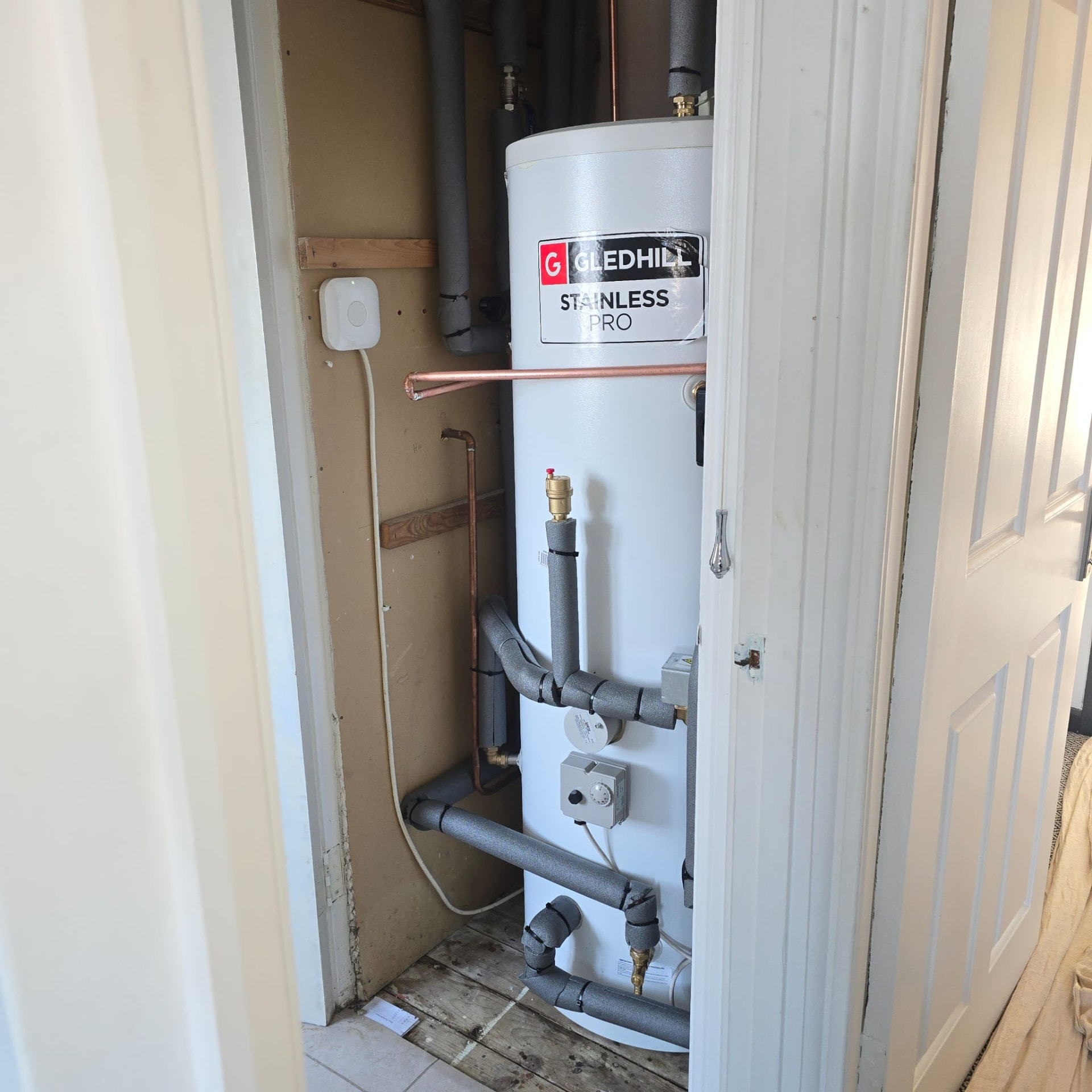 New Gledhill Stainless Pro unvented hot water cylinder installed with insulated pipework